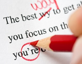 proofreading with a red pencil